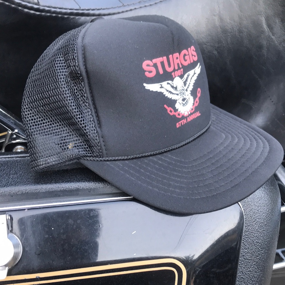 57th Sturgis 1997 bike rally trucker hat. Black with red and white print.
